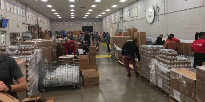 zvelo Volunteers at Food Bank of the Rockies. Packs boxes of food for CSFP